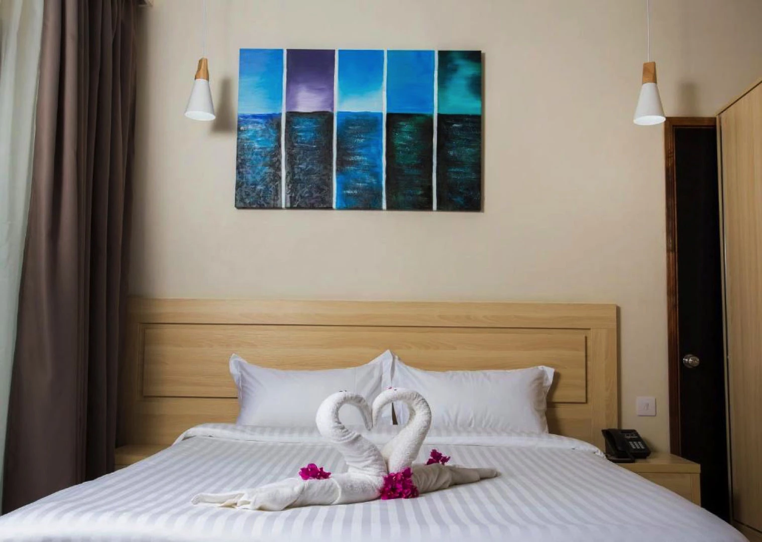 Double bedroom with king-size bed at Residence Potosi, carefully decorated