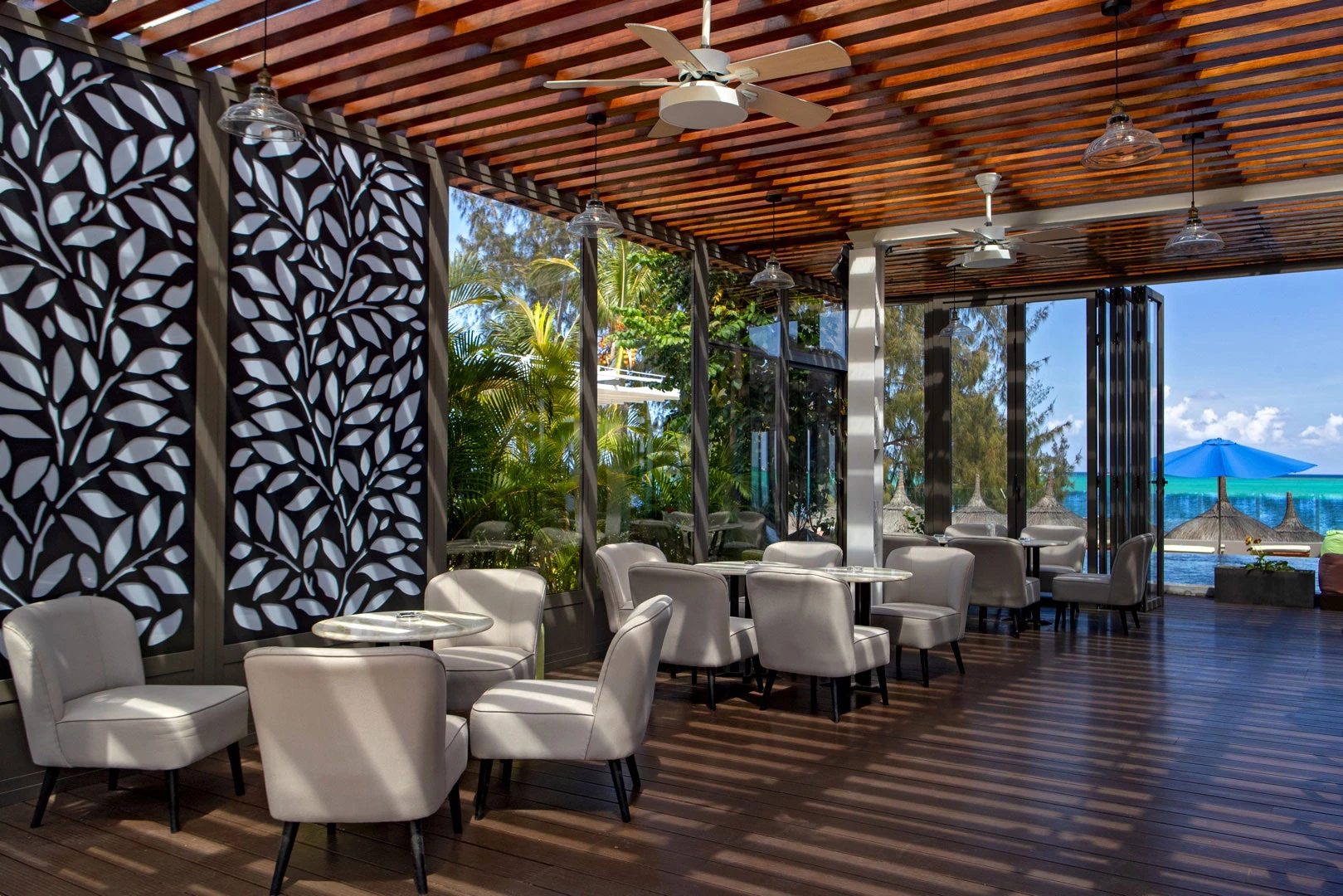 Chic and cosy lounge bar at Wonders Beach with views of the tropical garden