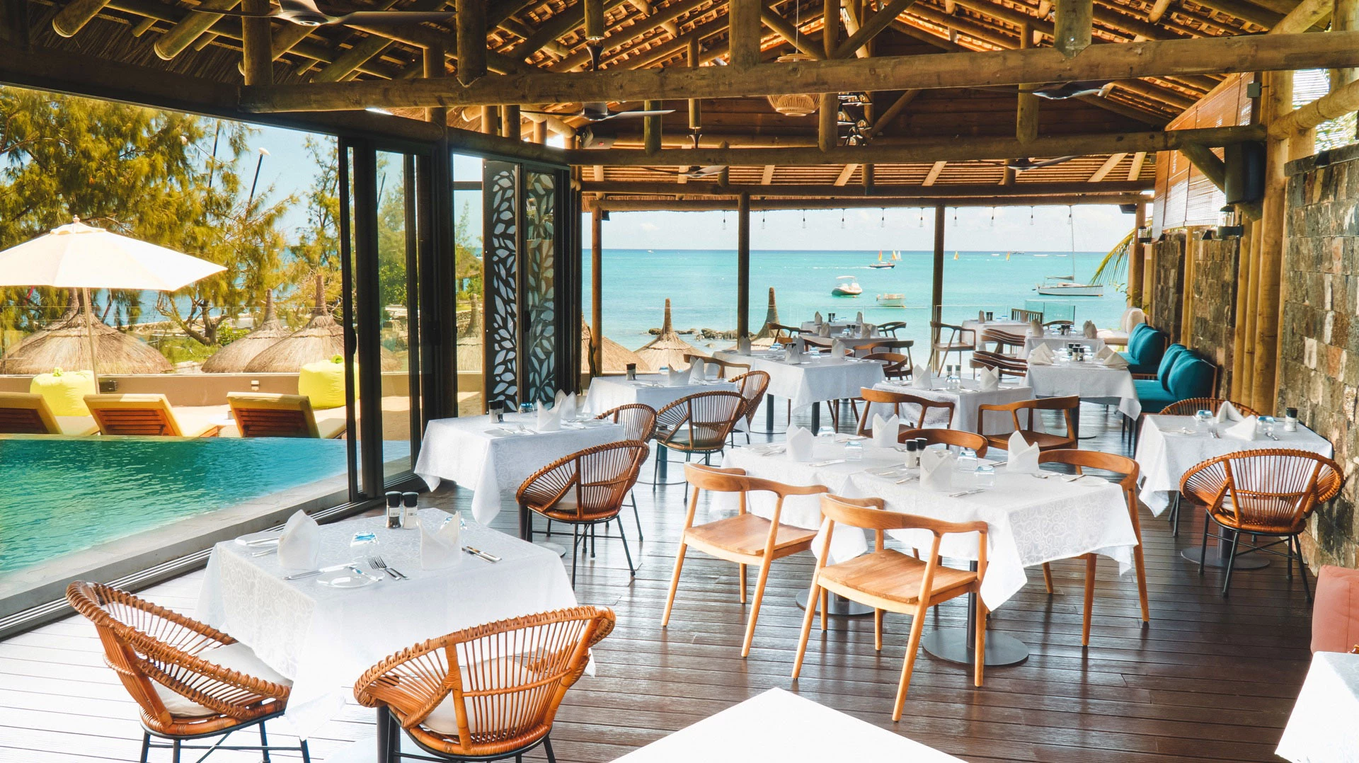 Seafront restaurant at Wonders Beach Boutique with terrace seating overlooking the lagoon.